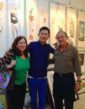 Beijing gallery with artist brother.JPG