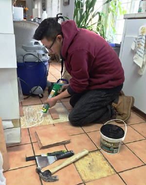 Jackie fixing tiles.jpg