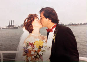 Pattie and Harlan at our wedding kissing.JPG