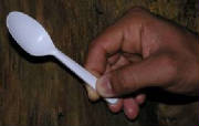 handholdingplasticspoon.jpg