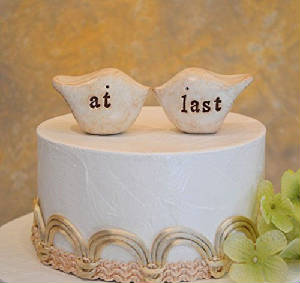 wedding cake topper with birds at last.jpg