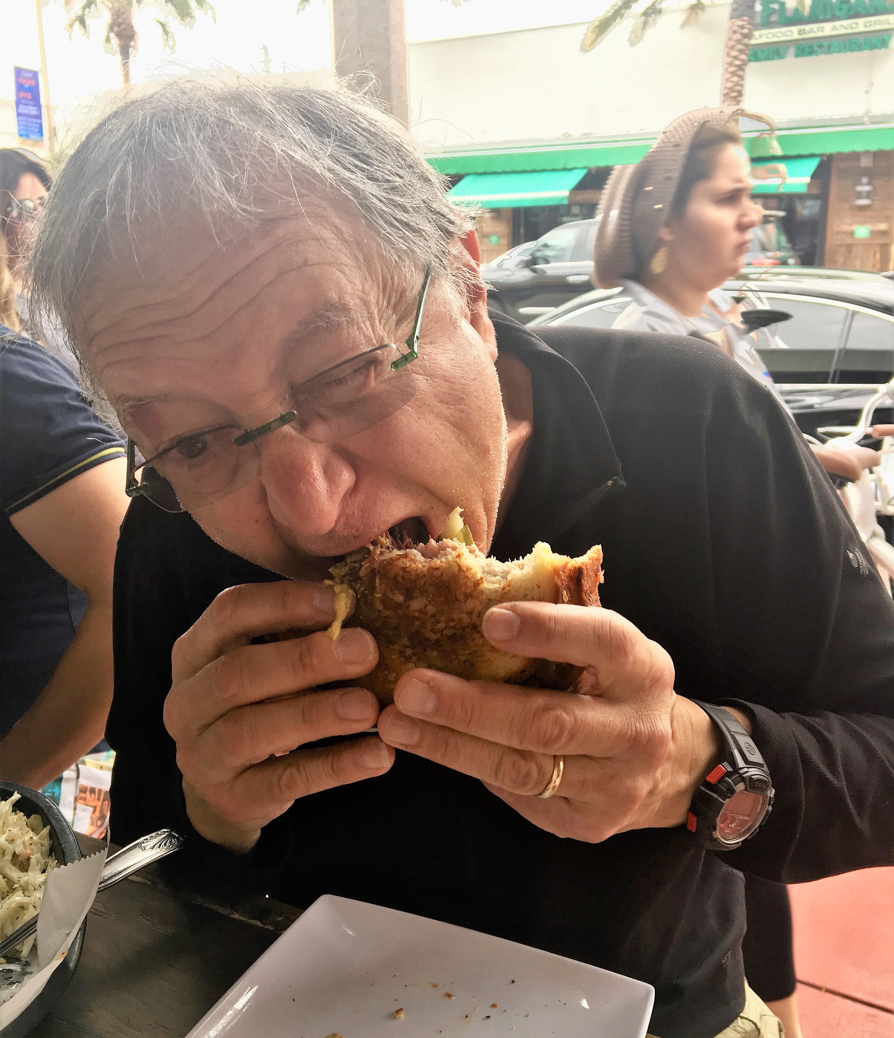 My husband devouring his half of the Jewban.jpg