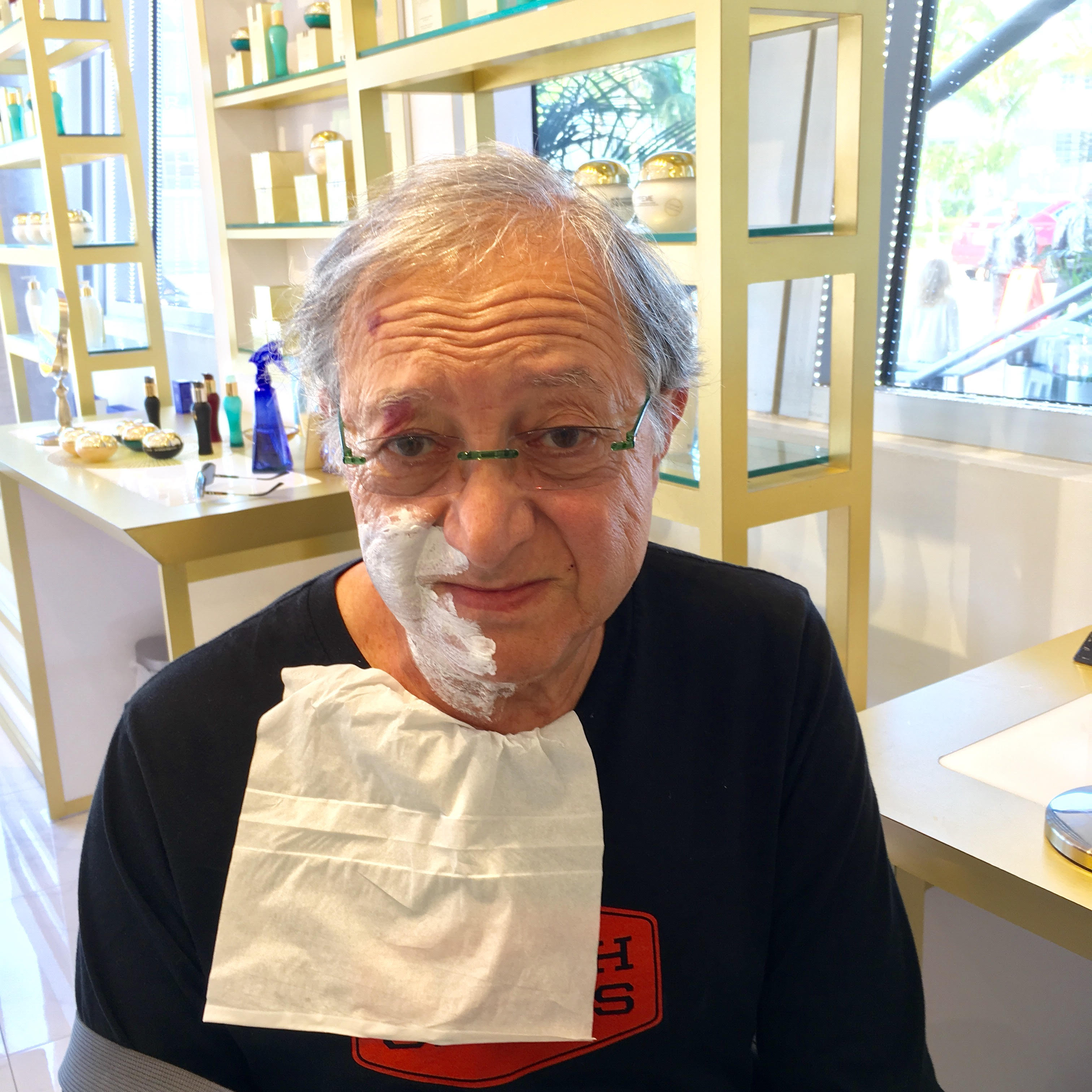 My husband in the facial salon.jpg