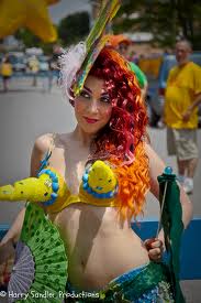 Mermaid parade goer with cones.jpg